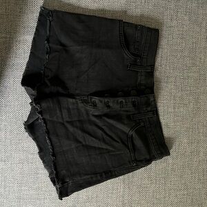 Madewell faded black denim shorts.